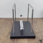 pendule de newton 7 billes design scientifique 771 1