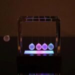 pendule de newton lumineux eblouissant pour decoration 529 1
