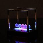 pendule de newton lumineux eblouissant pour decoration 695 1