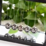 pendule de newton miroir elegant et unique 662 1