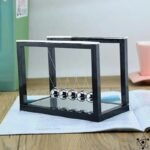 pendule de newton miroir elegant et unique 999 1