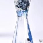 sablier stellaire avec liquide transparent et figurines 910 1