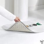 Tapis de Bain Science pour un Sanctuaire Innovant